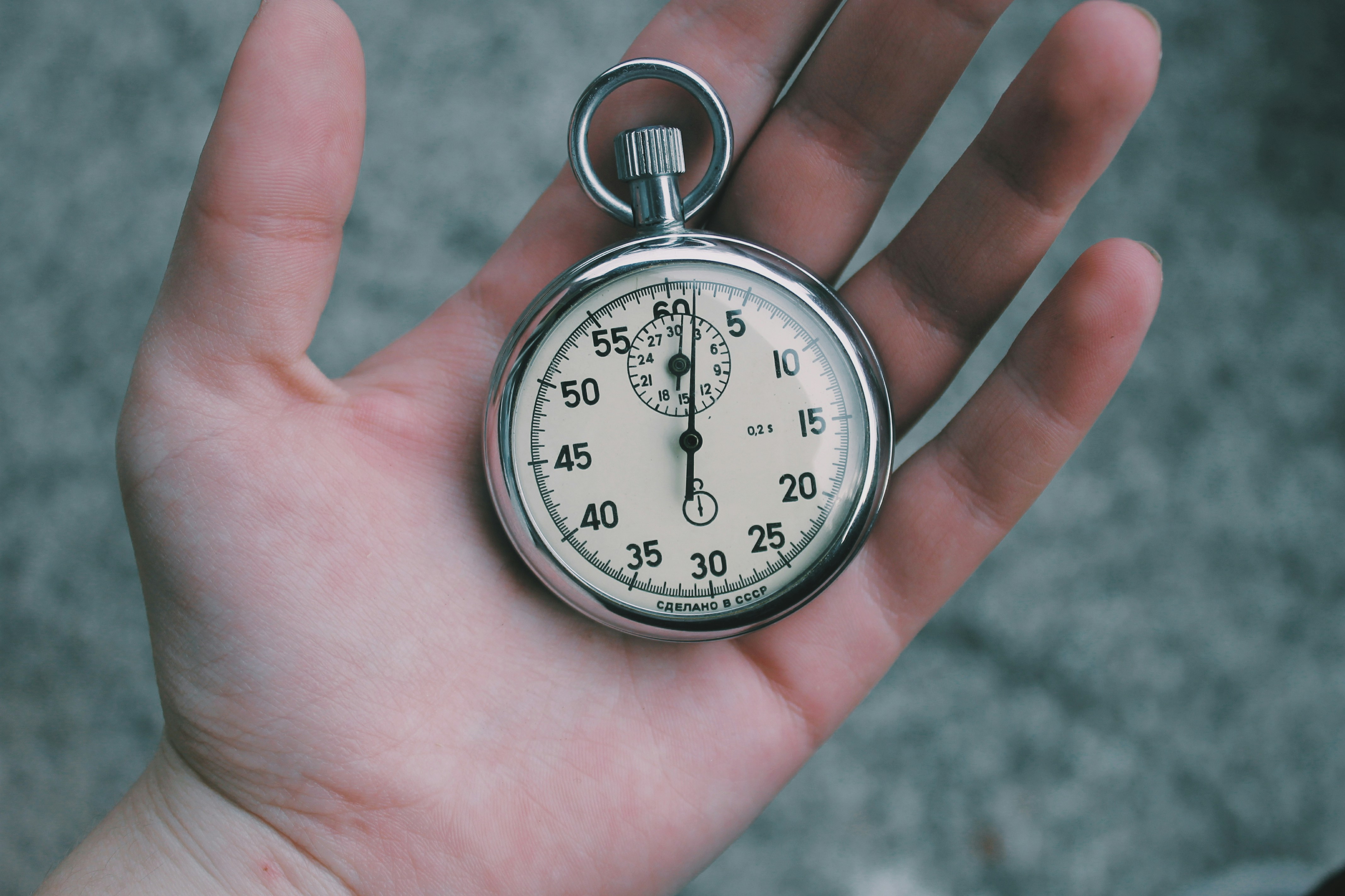 Photo of someone holding a stopwatch